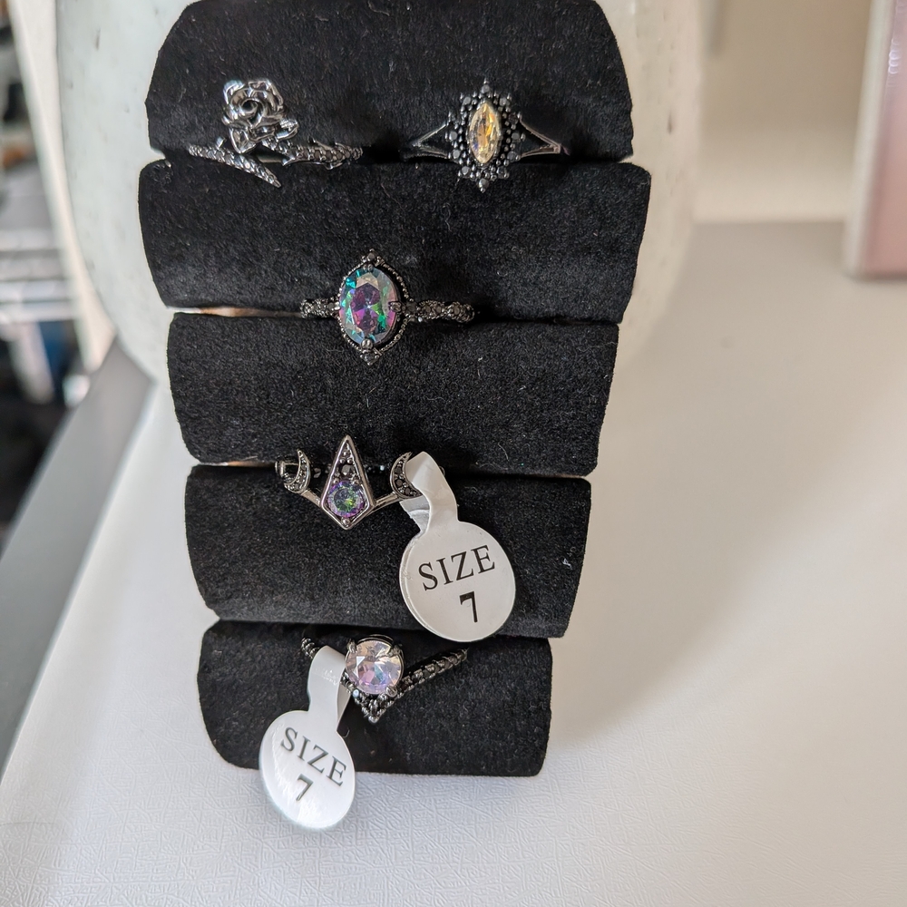 Fragrant Jewels Black and Silver Ring Collection